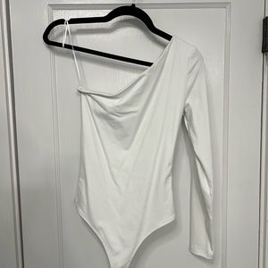 White one sleeve bodysuit. Size small, like new.